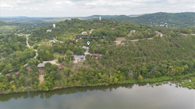 Welcome to 26 White River Ln in beautiful Holiday Island! This on Holiday Island Executive Golf Course in Arkansas - for sale on GolfHomes.com, golf home, golf lot