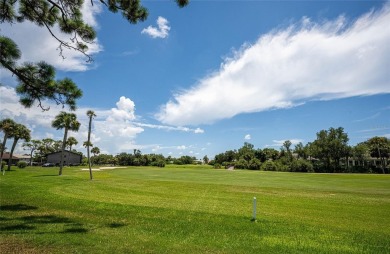 Located in the middle of just about anything you could need on Capri Isle Golf Club in Florida - for sale on GolfHomes.com, golf home, golf lot