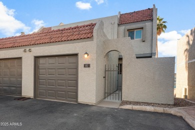 This updated 3-story townhome offers 3 bedrooms, 3 bathrooms on Dobson Ranch Municipal Golf Course in Arizona - for sale on GolfHomes.com, golf home, golf lot