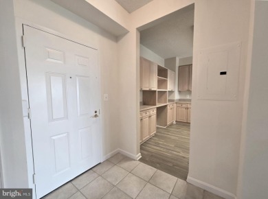 Sky-high living in this top floor condo with 2 spacious bedrooms on Leisure World Golf Club in Maryland - for sale on GolfHomes.com, golf home, golf lot