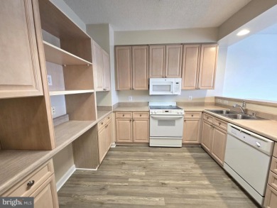 Sky-high living in this top floor condo with 2 spacious bedrooms on Leisure World Golf Club in Maryland - for sale on GolfHomes.com, golf home, golf lot