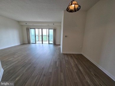 Sky-high living in this top floor condo with 2 spacious bedrooms on Leisure World Golf Club in Maryland - for sale on GolfHomes.com, golf home, golf lot