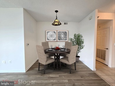 Sky-high living in this top floor condo with 2 spacious bedrooms on Leisure World Golf Club in Maryland - for sale on GolfHomes.com, golf home, golf lot