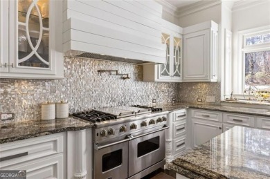 Introducing a triumph of luxury yet a warm, cozy home featured on TPC At Sugarloaf Golf Club in Georgia - for sale on GolfHomes.com, golf home, golf lot