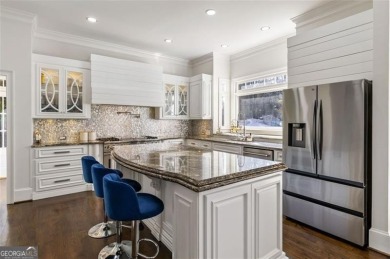 Introducing a triumph of luxury yet a warm, cozy home featured on TPC At Sugarloaf Golf Club in Georgia - for sale on GolfHomes.com, golf home, golf lot