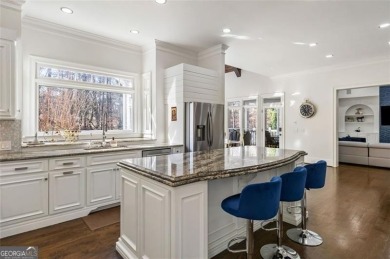 Introducing a triumph of luxury yet a warm, cozy home featured on TPC At Sugarloaf Golf Club in Georgia - for sale on GolfHomes.com, golf home, golf lot