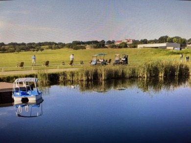 Located in the highly desirable gated community of Reflection on Hideout Golf Club and Resort  in Texas - for sale on GolfHomes.com, golf home, golf lot