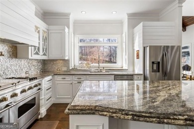 Introducing a triumph of luxury yet a warm, cozy home featured on TPC At Sugarloaf Golf Club in Georgia - for sale on GolfHomes.com, golf home, golf lot