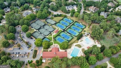 Introducing a triumph of luxury yet a warm, cozy home featured on TPC At Sugarloaf Golf Club in Georgia - for sale on GolfHomes.com, golf home, golf lot