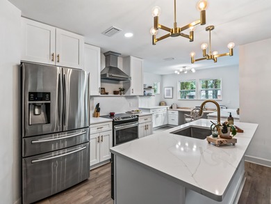 Completely renovated and move-in ready in the heart of on Wildwood Country Club in Florida - for sale on GolfHomes.com, golf home, golf lot