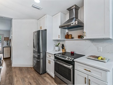 Completely renovated and move-in ready in the heart of on Wildwood Country Club in Florida - for sale on GolfHomes.com, golf home, golf lot