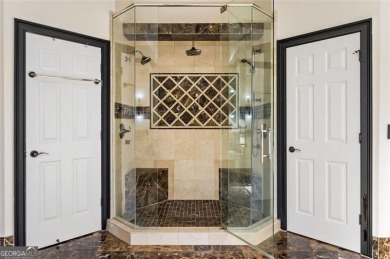 Introducing a triumph of luxury yet a warm, cozy home featured on TPC At Sugarloaf Golf Club in Georgia - for sale on GolfHomes.com, golf home, golf lot