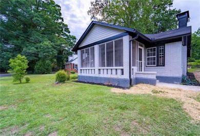 Walk in and welcome home to this Beautifully Renovated Bungalow on Alfred Tup Holmes Golf Course in Georgia - for sale on GolfHomes.com, golf home, golf lot