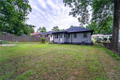 Walk in and welcome home to this Beautifully Renovated Bungalow on Alfred Tup Holmes Golf Course in Georgia - for sale on GolfHomes.com, golf home, golf lot