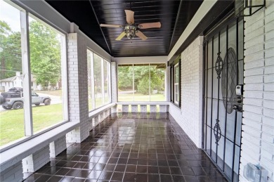 Walk in and welcome home to this Beautifully Renovated Bungalow on Alfred Tup Holmes Golf Course in Georgia - for sale on GolfHomes.com, golf home, golf lot