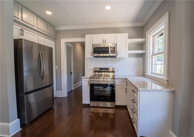 Walk in and welcome home to this Beautifully Renovated Bungalow on Alfred Tup Holmes Golf Course in Georgia - for sale on GolfHomes.com, golf home, golf lot