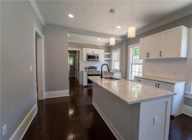 Walk in and welcome home to this Beautifully Renovated Bungalow on Alfred Tup Holmes Golf Course in Georgia - for sale on GolfHomes.com, golf home, golf lot