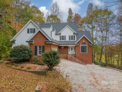 This beautifully remodeled home is nestled on nearly 1.5 acres on Green Oaks Golf Course in North Carolina - for sale on GolfHomes.com, golf home, golf lot