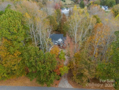 This beautifully remodeled home is nestled on nearly 1.5 acres on Green Oaks Golf Course in North Carolina - for sale on GolfHomes.com, golf home, golf lot