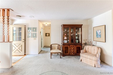 This charming Buttonwood model is a 2-bedroom, 2-bathroom 2-car on Timber Pines Golf Course in Florida - for sale on GolfHomes.com, golf home, golf lot