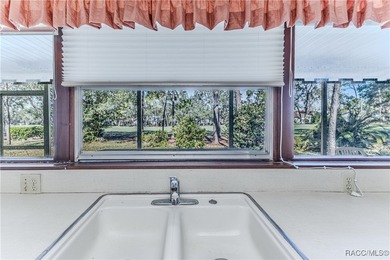 This charming Buttonwood model is a 2-bedroom, 2-bathroom 2-car on Timber Pines Golf Course in Florida - for sale on GolfHomes.com, golf home, golf lot