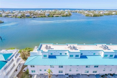 Awaken to sunny, sweeping views of the Intracoastal Waterway and on Lemon Bay Golf Club in Florida - for sale on GolfHomes.com, golf home, golf lot