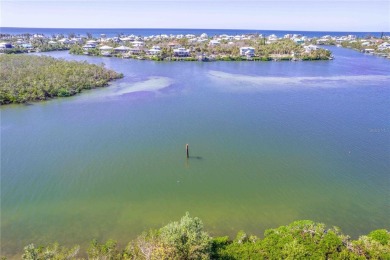 Awaken to sunny, sweeping views of the Intracoastal Waterway and on Lemon Bay Golf Club in Florida - for sale on GolfHomes.com, golf home, golf lot