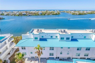 Awaken to sunny, sweeping views of the Intracoastal Waterway and on Lemon Bay Golf Club in Florida - for sale on GolfHomes.com, golf home, golf lot