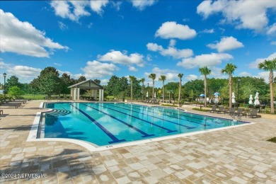 Lovely Pool Home located on a peaceful, private lot in desirable on Golf Club At South Hampton in Florida - for sale on GolfHomes.com, golf home, golf lot