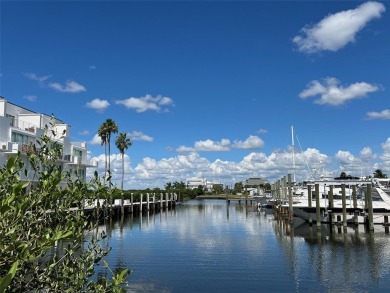 Awaken to sunny, sweeping views of the Intracoastal Waterway and on Lemon Bay Golf Club in Florida - for sale on GolfHomes.com, golf home, golf lot