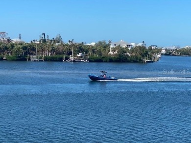 Awaken to sunny, sweeping views of the Intracoastal Waterway and on Lemon Bay Golf Club in Florida - for sale on GolfHomes.com, golf home, golf lot