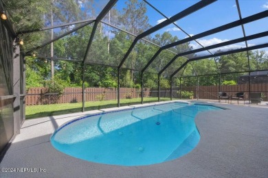 YOUR POOL HOME AWAITS! Located on a LARGE, PRIVATE LOT in the on Golf Club At South Hampton in Florida - for sale on GolfHomes.com, golf home, golf lot