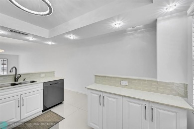 FULLY RENOVATED 2/2 IN THE WYNMOOR GOLF COMMUNITY. THE KITCHEN on Wynmoor Golf Course in Florida - for sale on GolfHomes.com, golf home, golf lot