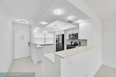 FULLY RENOVATED 2/2 IN THE WYNMOOR GOLF COMMUNITY. THE KITCHEN on Wynmoor Golf Course in Florida - for sale on GolfHomes.com, golf home, golf lot