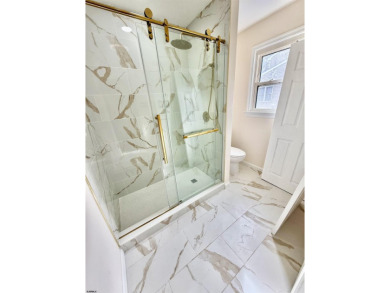 Captivating Fully Renovated 4-Bedroom Gem in the Heart of on Atlantic City Country Club in New Jersey - for sale on GolfHomes.com, golf home, golf lot