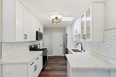 Everything is new! This quality remodel has 3br/2ba and has been on Sun City Country Club in Arizona - for sale on GolfHomes.com, golf home, golf lot