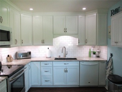 THIS SWEET HOME PACKS A BIG PUNCH !! Tastefully and sensibly on Preserve Golf Club in Florida - for sale on GolfHomes.com, golf home, golf lot