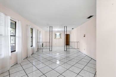 Endless potential and opportunity here! A spacious 4-bedroom, 2 on Jake Gaither Golf Course in Florida - for sale on GolfHomes.com, golf home, golf lot