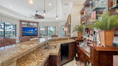 Bathed in natural light, with highly sought after southern lanai on The Oaks Club in Florida - for sale on GolfHomes.com, golf home, golf lot