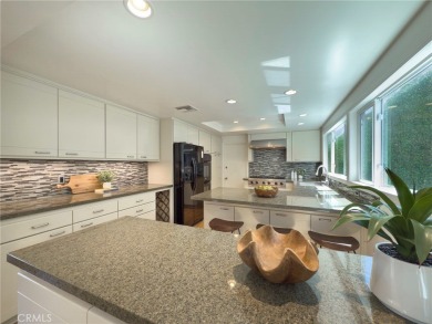 With sweeping views of Santa Ana Country Club Golf Course, this on Santa Ana Country Club in California - for sale on GolfHomes.com, golf home, golf lot