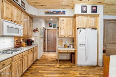 Escape to The Retreat at Bison Crossing, fairway cabin, where on Bison Golf and Country Club in Arizona - for sale on GolfHomes.com, golf home, golf lot