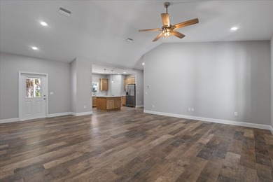 Brand New 2025 Custom Wade Home located in the most desirable on Chiefland Golf and Country Club in Florida - for sale on GolfHomes.com, golf home, golf lot