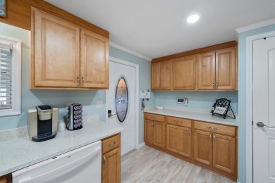 LOCATION, LOCATION! -- Spacious Island Home with tons of Natural on Spessard Holland Golf Course in Florida - for sale on GolfHomes.com, golf home, golf lot