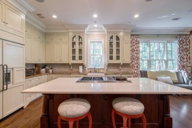 Lakefront retreat o Sunset views o Two outdoor kitchens o Steps on Reynolds Lake Oconee - The Oconee in Georgia - for sale on GolfHomes.com, golf home, golf lot
