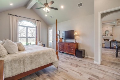 Gorgeous and better than new 4-bedroom, 3-full baths home on Pecan Plantation Country Club in Texas - for sale on GolfHomes.com, golf home, golf lot