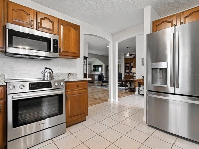 BOND PAID! Lovely 3 Bedroom, 2.5 Bathroom CYPRESS DESIGNER home on El Diablo Executive Golf Course in Florida - for sale on GolfHomes.com, golf home, golf lot