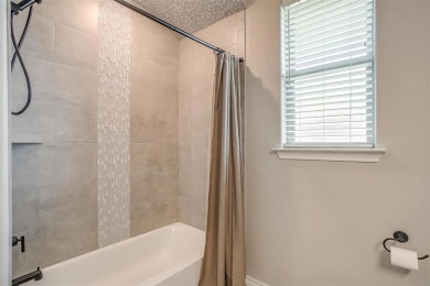 Gorgeous and better than new 4-bedroom, 3-full baths home on Pecan Plantation Country Club in Texas - for sale on GolfHomes.com, golf home, golf lot