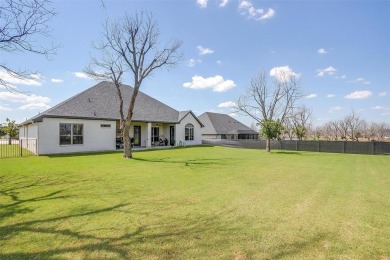Gorgeous and better than new 4-bedroom, 3-full baths home on Pecan Plantation Country Club in Texas - for sale on GolfHomes.com, golf home, golf lot