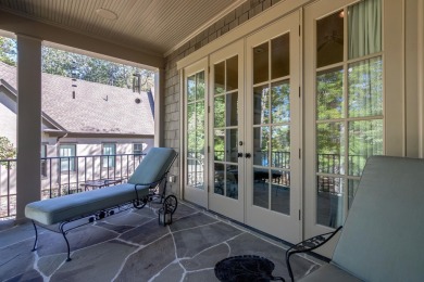 Lakefront retreat o Sunset views o Two outdoor kitchens o Steps on Reynolds Lake Oconee - The Oconee in Georgia - for sale on GolfHomes.com, golf home, golf lot
