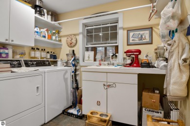 Beautiful 4-bedroom home on 1 private acre at the end of a quiet on Bay Meadows Golf Course - Executive in Michigan - for sale on GolfHomes.com, golf home, golf lot